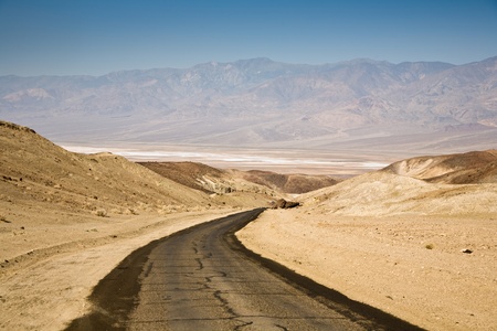driving on the Interstate 187 in Death valley direction Badwater in the heat of the Mojave Desertの写真素材