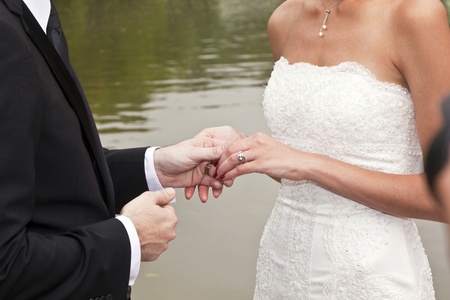 wedding couple are swearing lifetime loyality in the park in the wedding ceremonyの写真素材