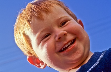 cute happy laughing young boyの写真素材