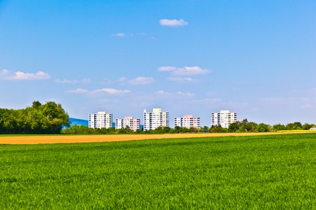 housing area in rural landscape with fieldsの写真素材