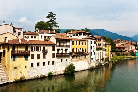 view over river Brenta in old village Basano del Grappa in Italyの写真素材