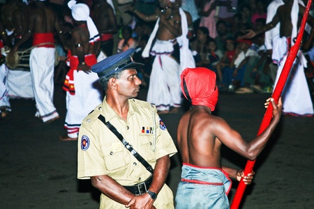 CANDY, SRI LANKA  - August 12: torchbearer  participate the festival Pera Hera in Candy to celebrate the tooth of Buddha  August 12,2005, Candy, Sri Lankaのeditorial素材