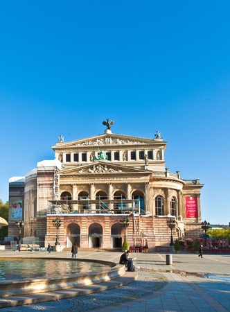 FRANKFURT, GERMANY - SEPTEMBER 10: view to Opernplatz and Opera House of Frankfurt partly under reconstruction with fountain early morning on September 10,2009 Frankfurt,Germany.のeditorial素材