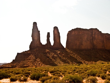 famous sandstone Rocks called Three Sieters Butte in monument valleyの写真素材
