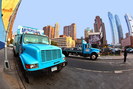 NEW YORK CITY - JULY 8:  Cityview of New York from the eastside of the harbor in late afternoon, empty lorries  at the street on July 8, 2010 in Manhattan, New York City.のeditorial素材