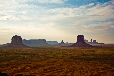 giant Buttes, formations  made of sandstone in the Monument valley seen from Artists point at sunsetの写真素材