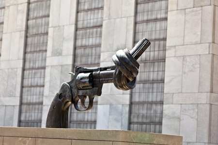 NEW YORK, USA - JULY 12:  Gun tied in a knot outside UN headquarters as symbol for reaching peace, New York City on July 12,2010のeditorial素材