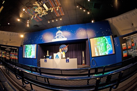 ORLANDO, USA - JULY 25: The guide gives an introduction to the Kennedy Space Center  in a big aula...