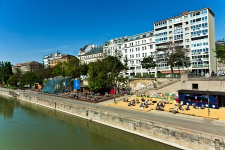 VIENNA, AUSTRIA - APRIL 25: People are relaying at the beach of the Danuvia canal in Vienna on the first bright warm day of the year on April, 25,2009 in Vienna, Austria.のeditorial素材