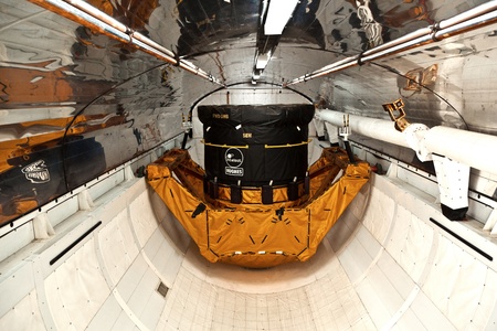 ORLANDO, USA - JULY 25: inside the space shuttle Explorer with a satellite as load in the belly  on July 25, 2010 in Orlando, USA.のeditorial素材