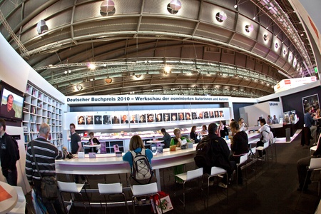 FRANKFURT, GERMANY - OCTOBER 10: public day for Frankfurt Book fair, visitors inside the hall  on October 10, 2010 in Frankfurt, Germany.のeditorial素材