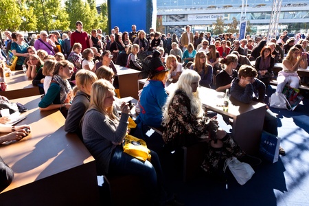 FRANKFURT, GERMANY - OCTOBER 10: Public day at Frankfurt international Book Fair, people watching a...