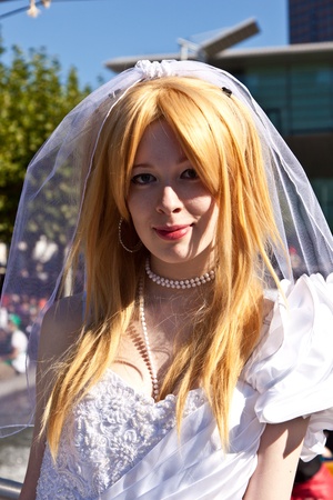 FRANKFURT, GERMANY - OCTOBER 10: Public day at Frankfurt international Book Fair, colorful girl made up as Bride  and poses for photografers on October 10, 2010 in Frankfurt, Germany.のeditorial素材
