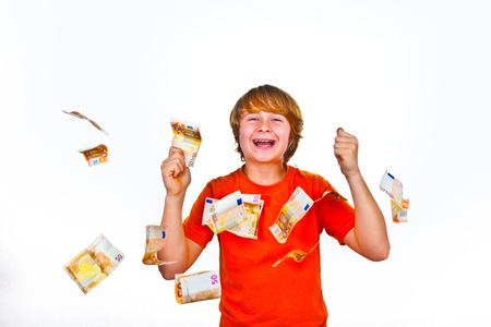 Euros flying around a boys headの写真素材