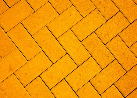 pavement pattern made with cast concrete blocks in yellow colorの写真素材