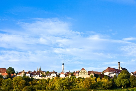 Rothenburg ob der Tauber, old famous city from medieval times seen from the romantic valley of the river Tauberの写真素材