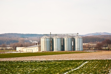 acres with snow in winter in beautiful light and structureの写真素材