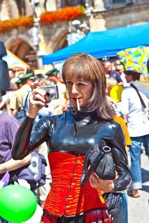 MUNICH, GERMANY - JULY 09 : people celebrate the Christopher Street Day in Munich with colorful costumes  at July 09,2011 in Munich, Germany. It is the worlds biggest party for gay people.のeditorial素材