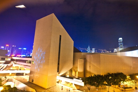 KOWLOON, HONKGONG - JANUARY 9:  View to modern cultural center by night on  January 09,2010 Kowloon,...