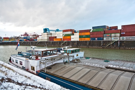 MAINZ, GERMANY - JANUARY 1: ships in container harbor in Winter on January, 1, 2010 in Mainz, Germany. He was constructed by Eduard Kreyssig in 1887 on base of a roman war harbor.のeditorial素材