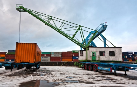 MAINZ, GERMANY - JANUARY 1: crane and container in harbor in Winter on January, 1, 2010 in Mainz,...
