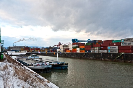 MAINZ, GERMANY - JANUARY 1: ships in container harbor in Winter on January, 1, 2010 in Mainz, Germany. He was constructed by Eduard Kreyssig between 1880 and 1887 on base of a roman war harbor.のeditorial素材