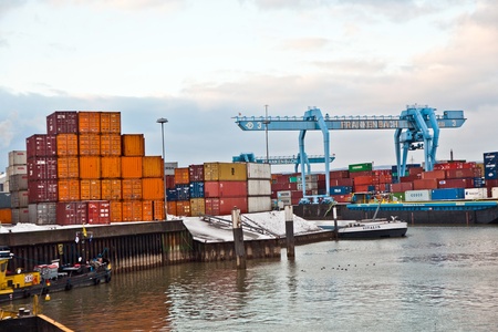 MAINZ, GERMANY - JANUARY 1: ships in container harbor in Winter on January, 1, 2010 in Mainz, Germany. He was constructed by Eduard Kreyssig between 1880 and 1887 on base of a roman war harbor.のeditorial素材