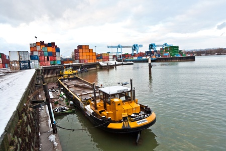 MAINZ, GERMANY - JANUARY 1: ships in container harbor in Winter on January, 1, 2010 in Mainz, Germany. He was constructed by Eduard Kreyssig between 1880 and 1887 on base of a roman war harbor.のeditorial素材