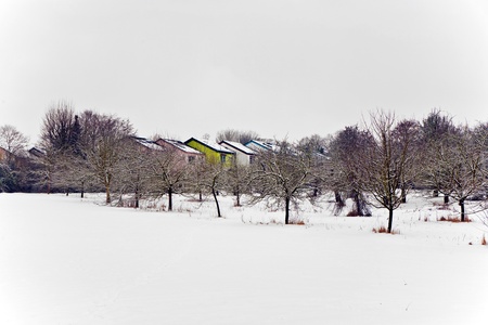 settlement in winter landscapeの写真素材