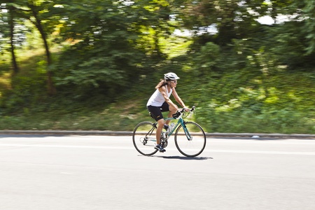 NEW YORK CITY - July 11: people cycle in the Central Park on July 11, 2010 in New York City. Central...