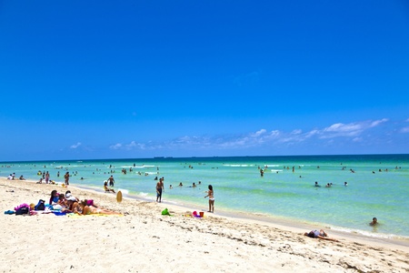 MIAMI BEACH, USA - JULY 27: People enyoy the beach and swimming in South Beach on July 27,2010 in Miami Beach, Florida. This area was the first section of Miami Beach to be developed, starting in the 1910s.のeditorial素材