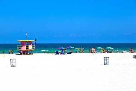 MIAMI BEACH, USA - JULY 27: People enjoy swimming in South Beach on July 27,2010 in Miami Beach, USA. In 1870, Henry and Charles Lum purchased the area and his daughter Taylor named it South Beach.のeditorial素材