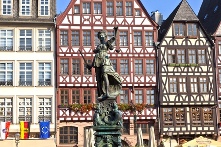 Statue of Lady Justice in front of the Romer in Frankfurt - Germanyの写真素材