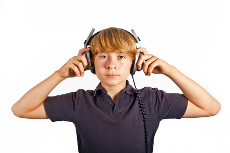 boy enjoys listening to music with headphonesの写真素材