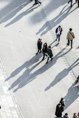 FRANKFURT - GERMANY, MARCH 03: people walk along the Zeil in Midday on March 03,2011 in Frankfurt, Germany. Since the  19th century it is of the most famous and busiest shopping streets in Germanyのeditorial素材