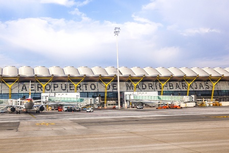 MADRID, SPAIN - APRIL 1: Aircrafts park at Terminal 4 at Barajay Airport  on April, 1 2012 in Madrid, Spain. In 2010, over 49.8 million passengers used Madrid-Barajas, making it the countrys largest airport.のeditorial素材