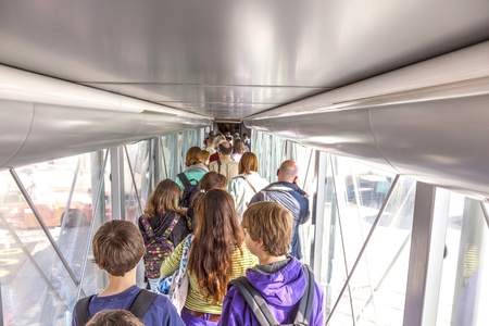 MADRID, SPAIN - APRIL 1: passenger boarding the plane at Terminal 4 at Barajay Airport  on April 1,2012 in Madrid, Spain. In 2010, over 49.8 million passengers used Barajas, making it the countrys largest airport.のeditorial素材