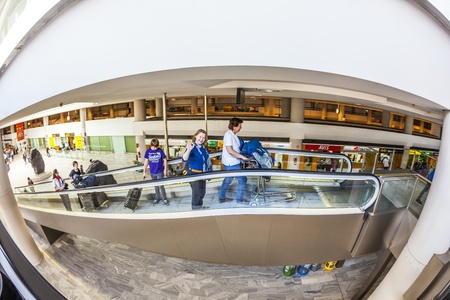 ARRECIFE, SPAIN - APRIL 1: tourists leave the airport with their baggage at Lanzarote on April 1,2012 in Arrecife, Spain. The new terminal was build in 1999 and has a capacity of 6 Mio passenger per year.のeditorial素材