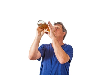 man drinking out of a glassの写真素材