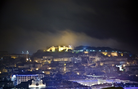 Lisbon, view to castle Castel Sao Jorge by nightのeditorial素材
