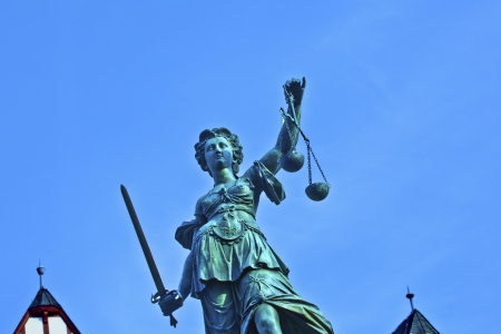 Statue of Lady Justice in front of the Romer in Frankfurt - Germanyの写真素材