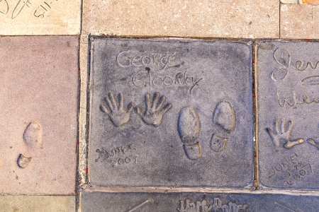 LOS ANGELES - JUNE 26:  handprints in Hollywood Boulevard on June 26,2012 in Los Angeles. There are nearly 200 celebrity handprints in the concrete of Chinese Theatreのeditorial素材