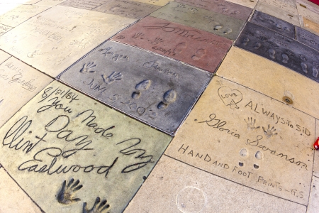 LOS ANGELES - JUNE 26:  handprints of Clint Eastwood  in Hollywood Boulevard on June 26,2012 in Los Angeles. There are nearly 200 celebrity handprints in the concrete of Chinese Theatre's forecourt.のeditorial素材