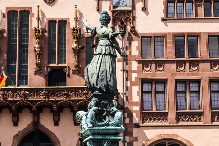 Statue of Lady Justice in front of the Romer in Frankfurt - Germanyの写真素材