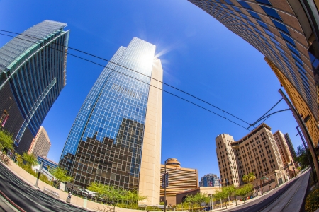 PHOENIX - JUNE 14: perspective of skyscrapers downtown at central avenue on June 14,2012 in Phoenix. Central Avenue represents almost every architectural use and style found in Phoenix.のeditorial素材