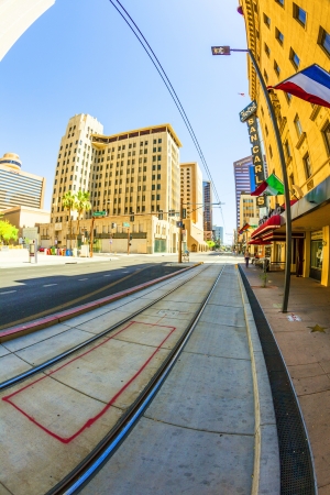 PHOENIX - JUNE 14: perspective of skyscrapers downtown at central avenue on June 14,2012 in Phoenix. Central Avenue represents almost every architectural use and style found in Phoenix.のeditorial素材