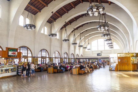 SAN DIEGO, USA - JUNE 11: people wait for the trains inside Union Station on June 11, 2012 in San Diego, USA. The Spanish Colonial Revival style station opened on March 8, 1915 as Santa Fe Depot.のeditorial素材
