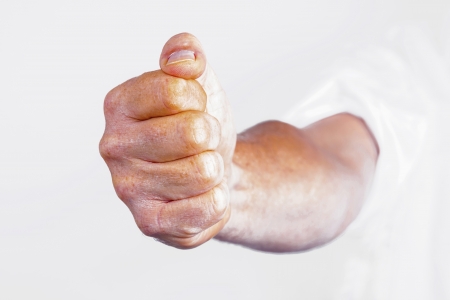 detail of male fist in white business shirtの写真素材