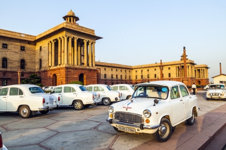 DELHI, INDIA - OCTOBER 16: Official Hindustan Ambassador cars parked outside North Block, Secretariat Building, on October 16, 2012 in Delhi, India. The production started in 1958 on base of the Morris Oxford model.のeditorial素材