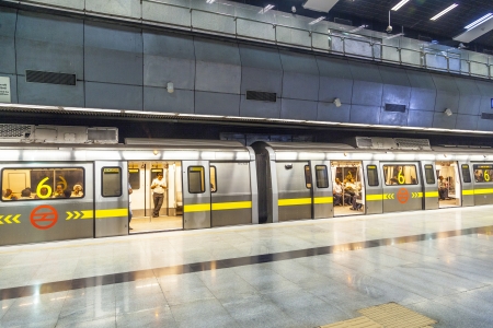 DELHI, INDIA - OCTOBER 16: passengers alighting metro train on October 16, 2012 in Delhi, India. Nealy 1 million passengers use the metro daily.のeditorial素材